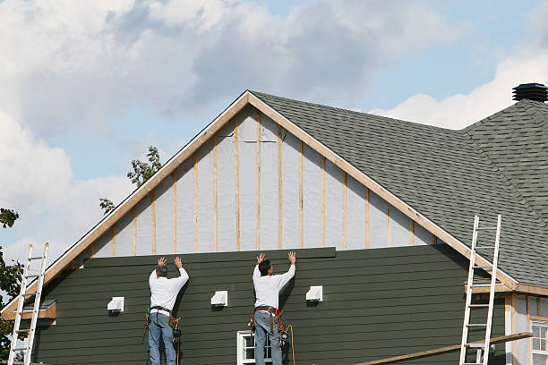 Professional Siding technician working in Leetonia, OH